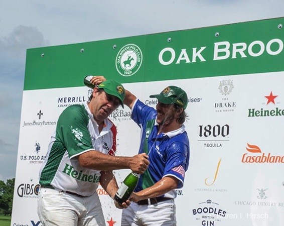 Opponents spray each other with champagne in celebration